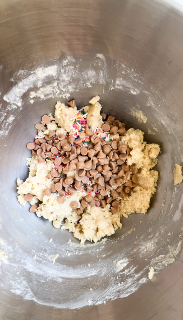 Sugar cookies with sprinkle, chocolate chips, and peanut butter chips. 