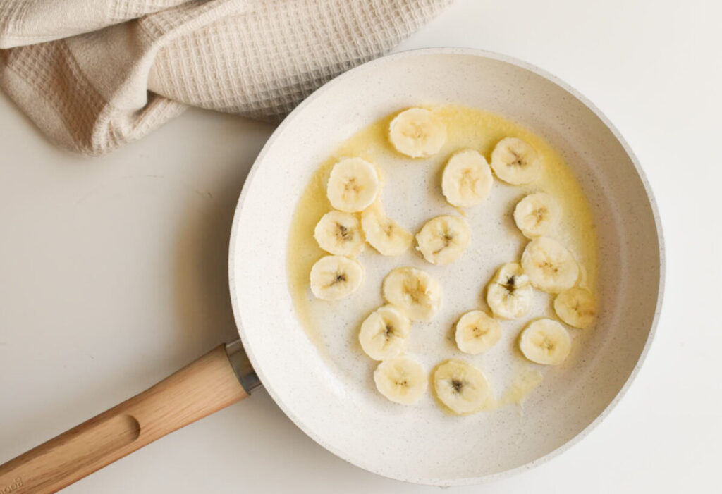 caramelize bananas in a pan with butter or coconut oil