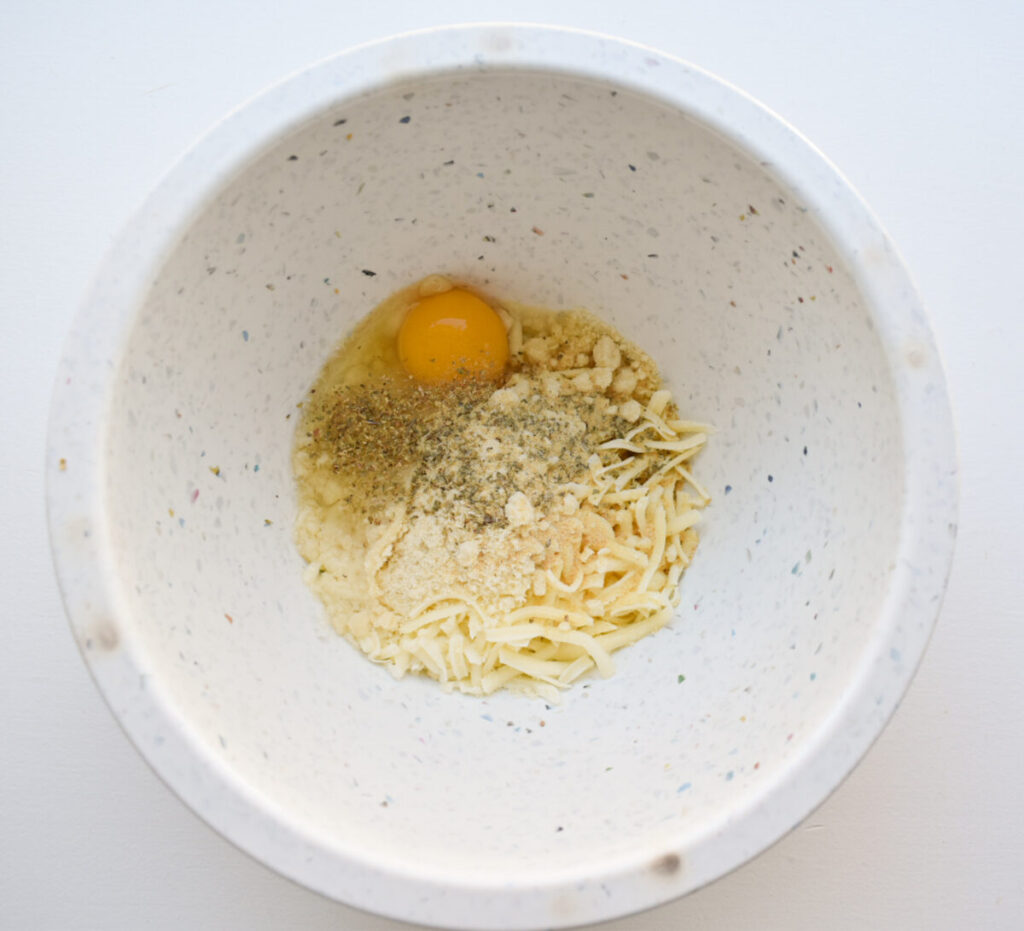 keto bread ingredients, including seasoning in a small bowl before mixing. 