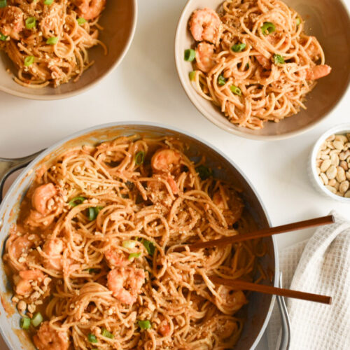 Homemade peanut sauce served with noodles and shrimp.