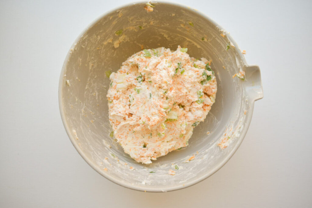 Combine cream cheese mixture for holiday cheese ball recipe