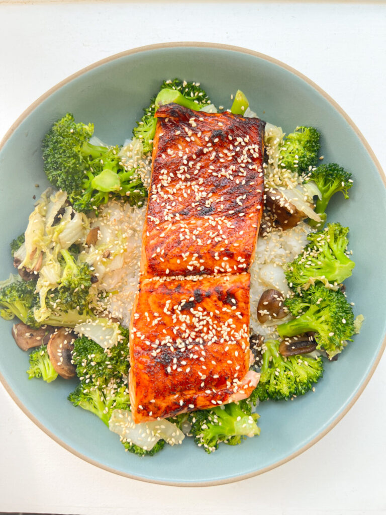 Air fryer salmon served with mashed potatoes and broccoli.