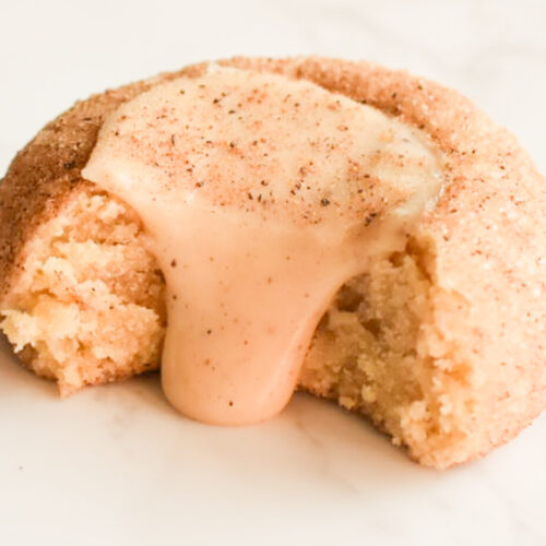 eggnog snickerdoodle cookie with ganache