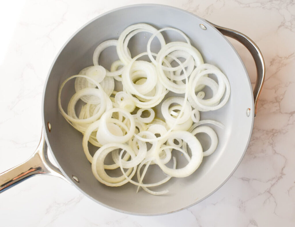 raw onions in a pan