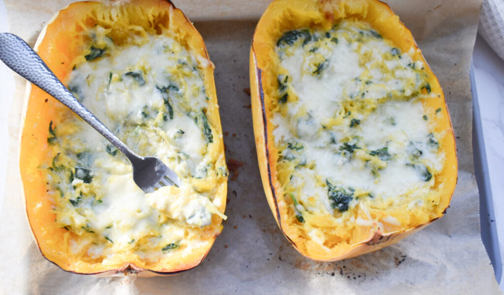 roasted spaghetti squash topped with cheesy sauce