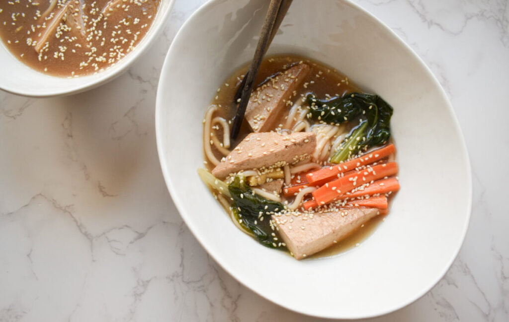 miso soup with tofu, carrots, and swiss chard