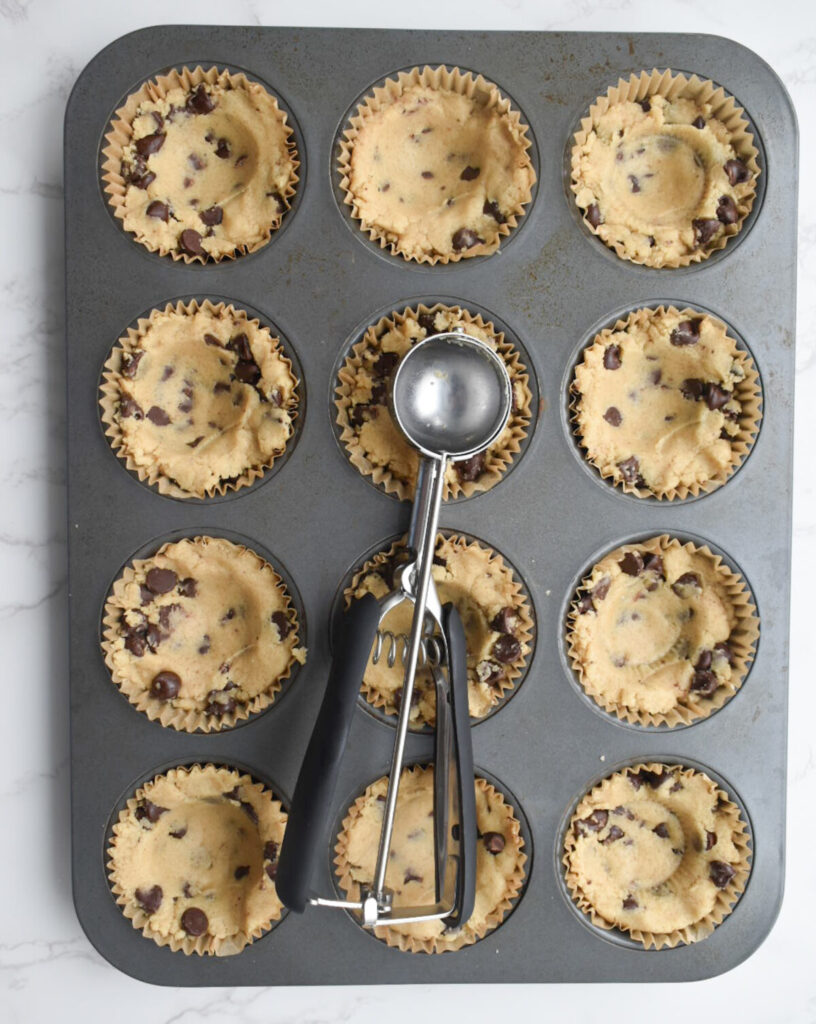 add dough to muffin tin