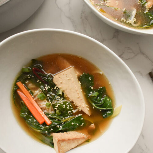 miso soup with tofu, udon noodles and vegetables