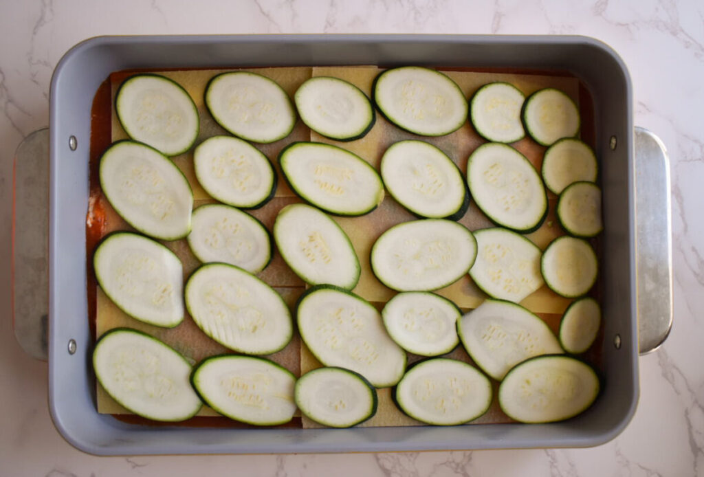 layers of thinly sliced zucchini in veggie lasagna