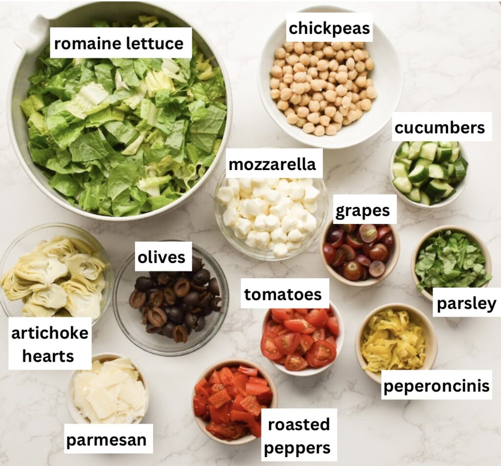 ingredients in homemade mediterranean salad with greek dressing