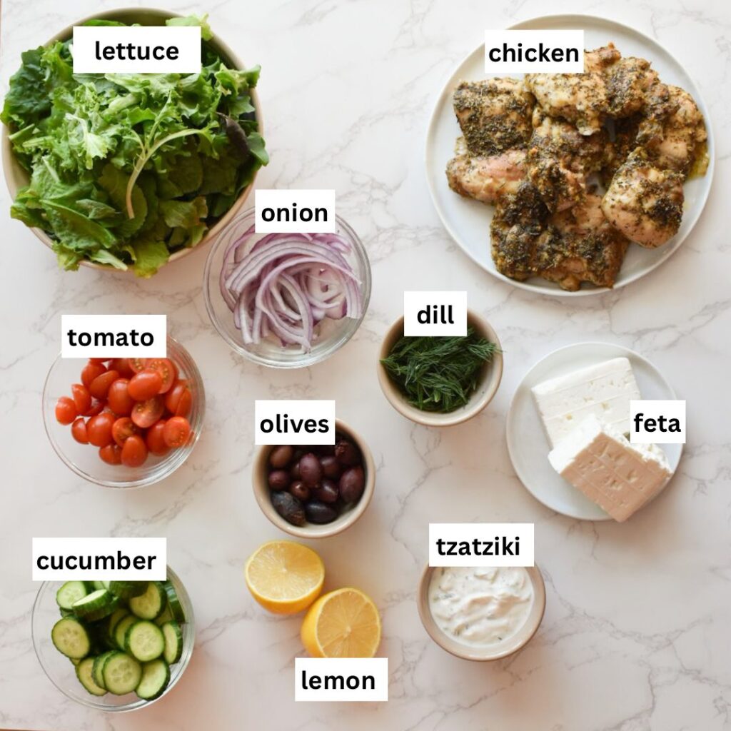 ingredients in homemade green salad with tzatziki dressing