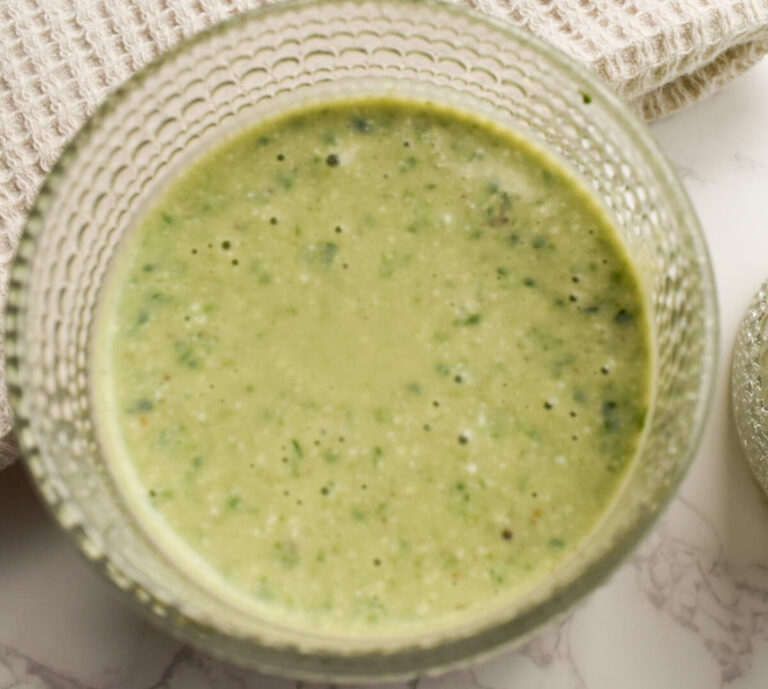 Green smoothie with spinach, banana, cottage cheese, and collagen powder