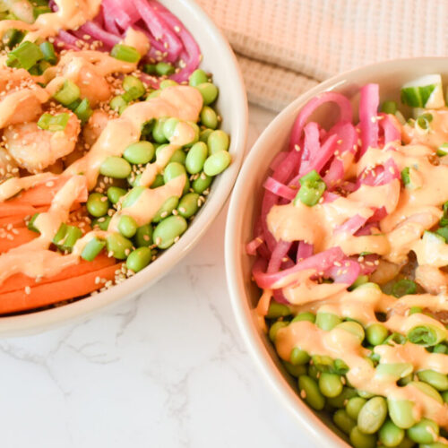 poke bowls with shrimp, rice, primal kitchen sauce, and vegies