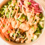 shrimp poke bowl with rice, veggies, and special sauce